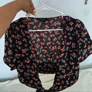 Strawberry blouse with tie at the front.